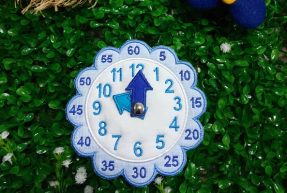 Learning Time Clock: A Charming Embroidery Design for Meaningful Gifts